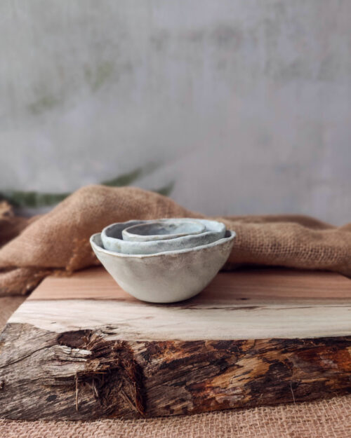 Neo Dove Nest of Small bowls with soft matte grey glaze on pinched handbuilt bowls